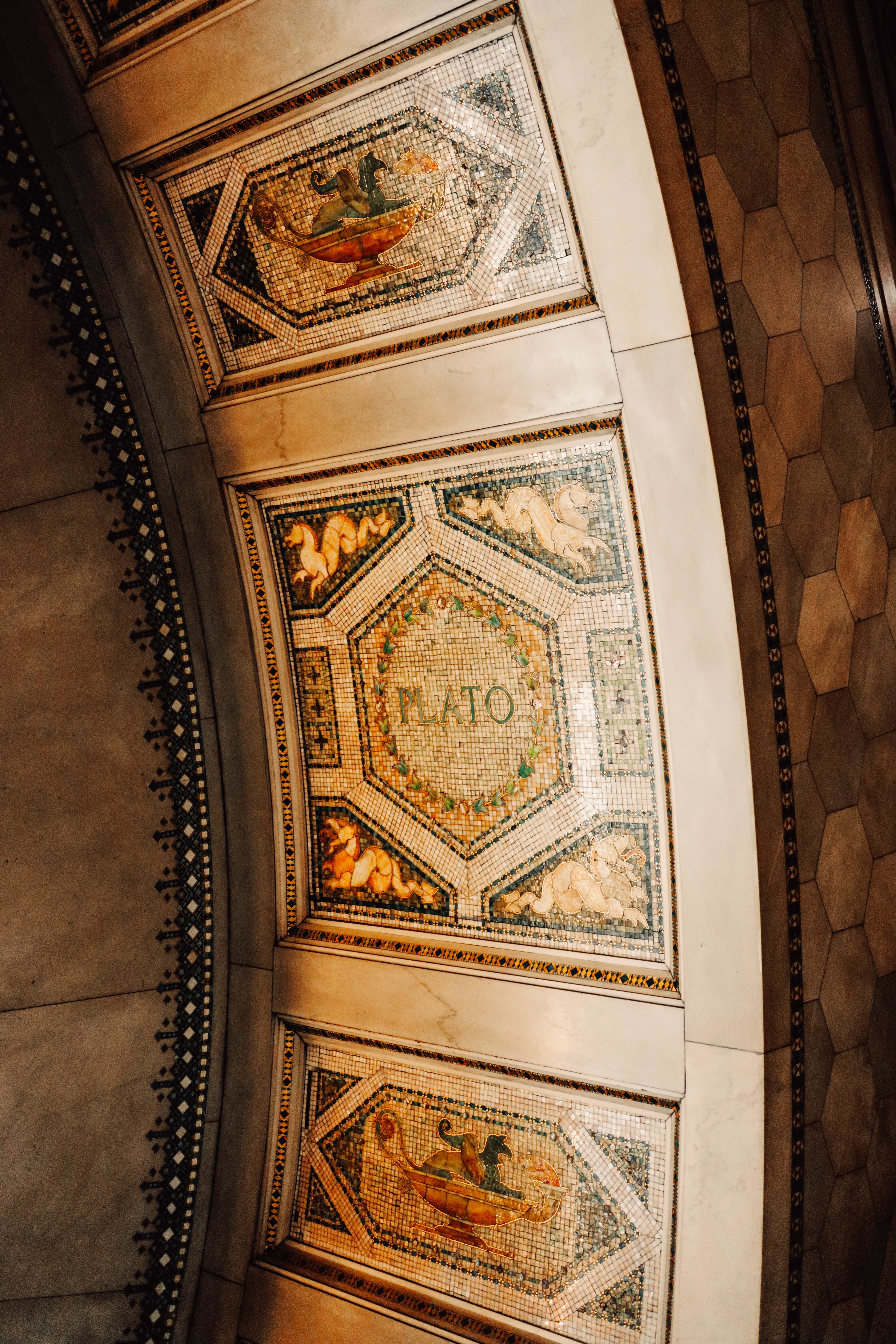 Chicago Cultural Center ceiling mosaic — PLATO inscribed in ornate tile arch, warm tones
