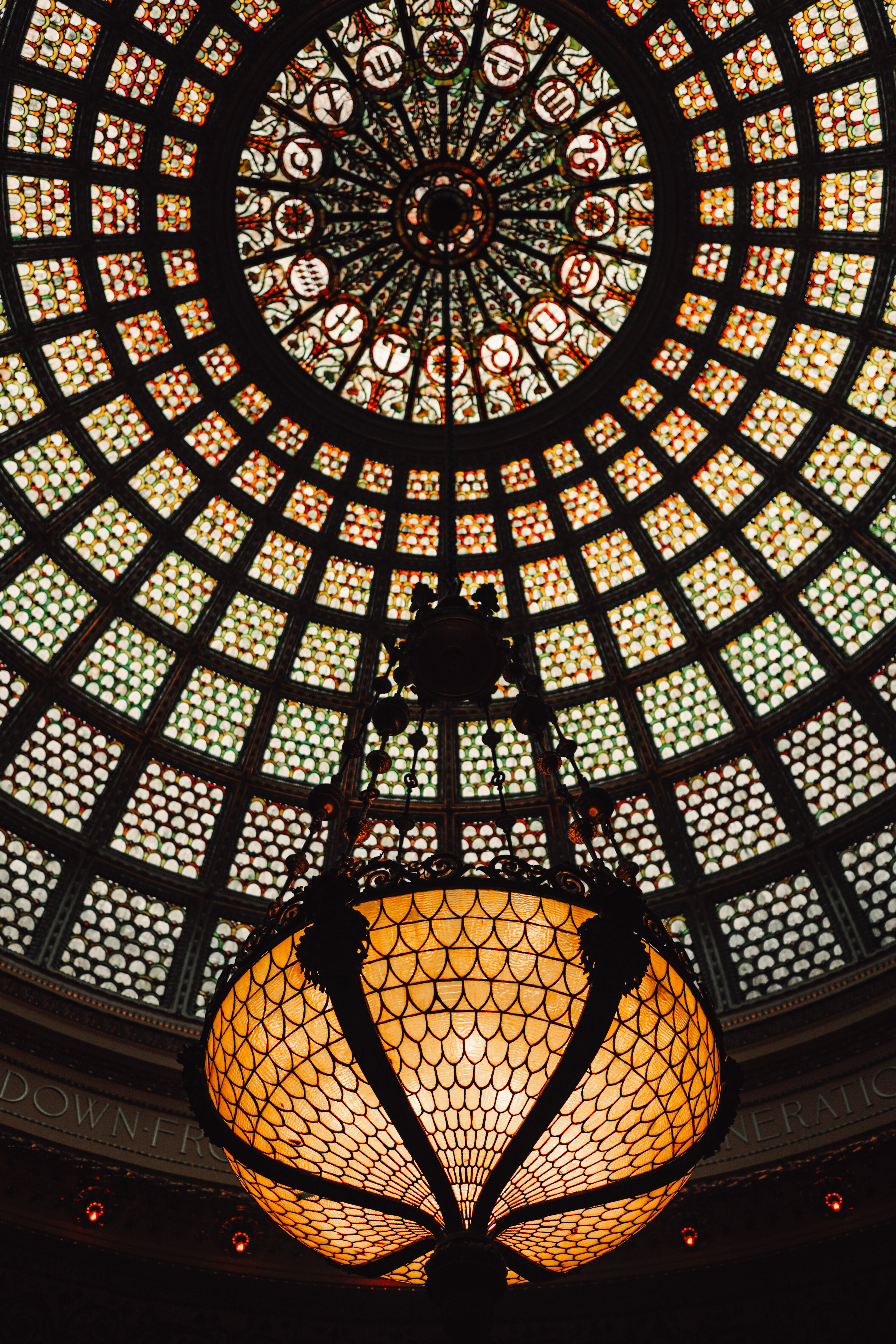 Tiffany glass dome at the Chicago Cultural Center — looking straight up into warm mosaic