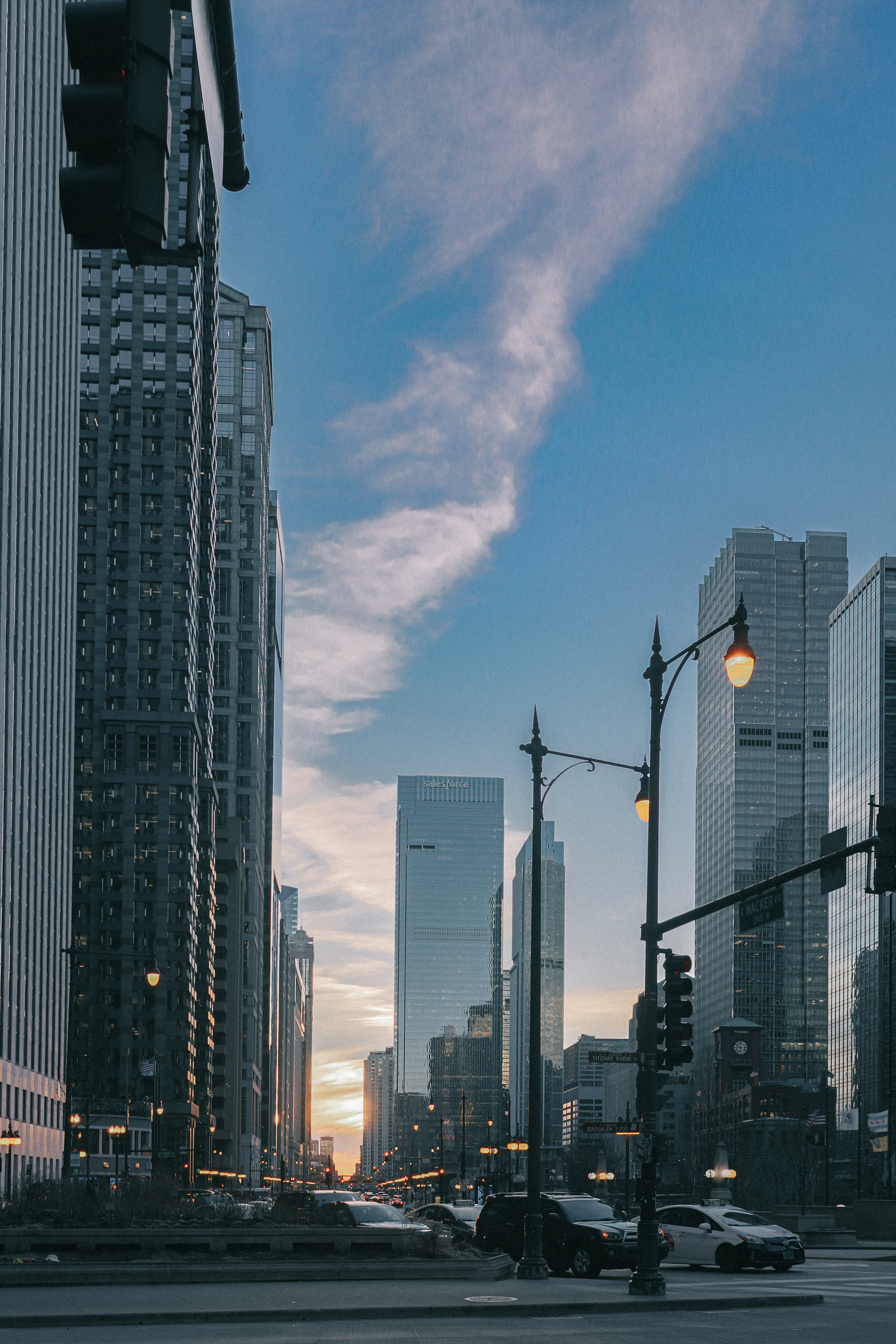Golden hour on North Michigan Avenue — skyscraper canyon lit warm