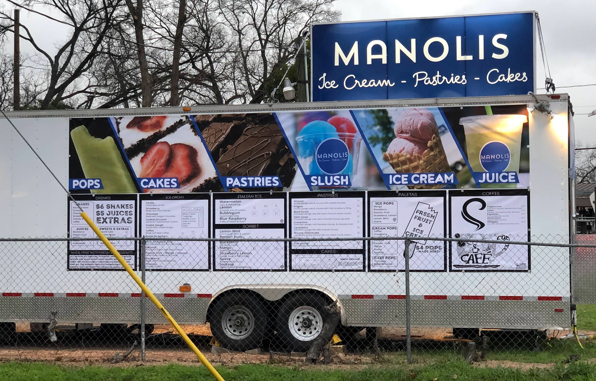 Manolis trailer — full side with banner and menus in context